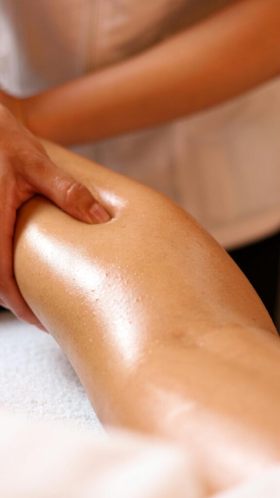 pexels-photo-10893344-10893344 Close-up of a relaxing leg massage in a spa, highlighting wellness and relaxation.